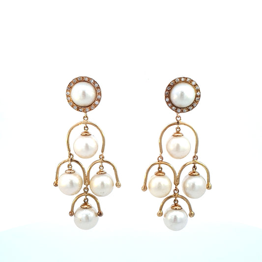 ARETES COLGANTES CON PERLAS Y DIAMANTES