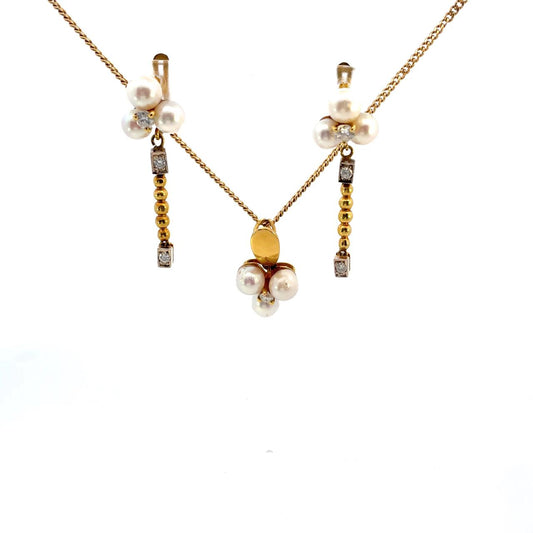 SET DE ARETES Y DIJE CON DIAMANTES Y PERLAS