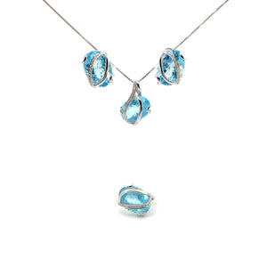 SET DE ARETES , ANILLO Y DIJE CON DIAMANTES Y TOPACIO