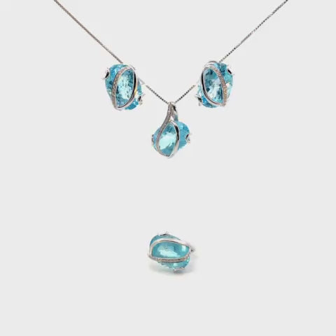 SET DE ARETES , ANILLO Y DIJE CON DIAMANTES Y TOPACIO