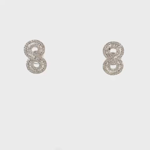 ARETES CON DIAMANTES DE FORMA DE INFINITO 0.82 CT